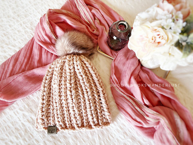 Pink knitted pom-pom beanie