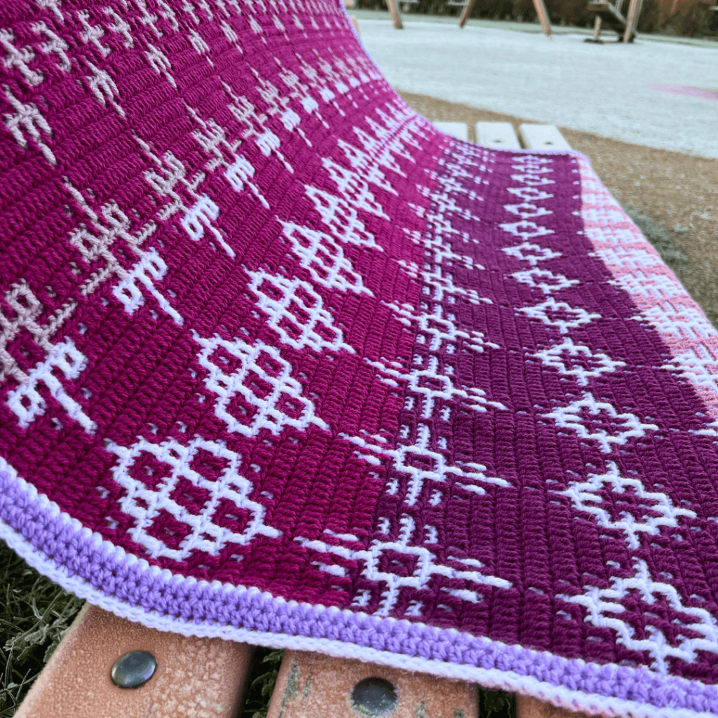 Magenta crochet blanket white pattern