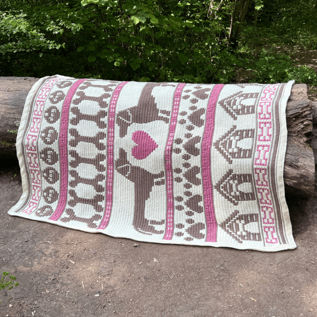 Crocheted dog blanket forest log