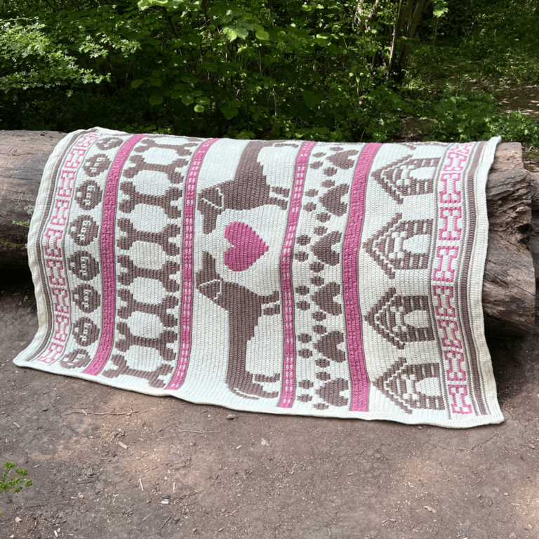 Crocheted dog blanket forest log