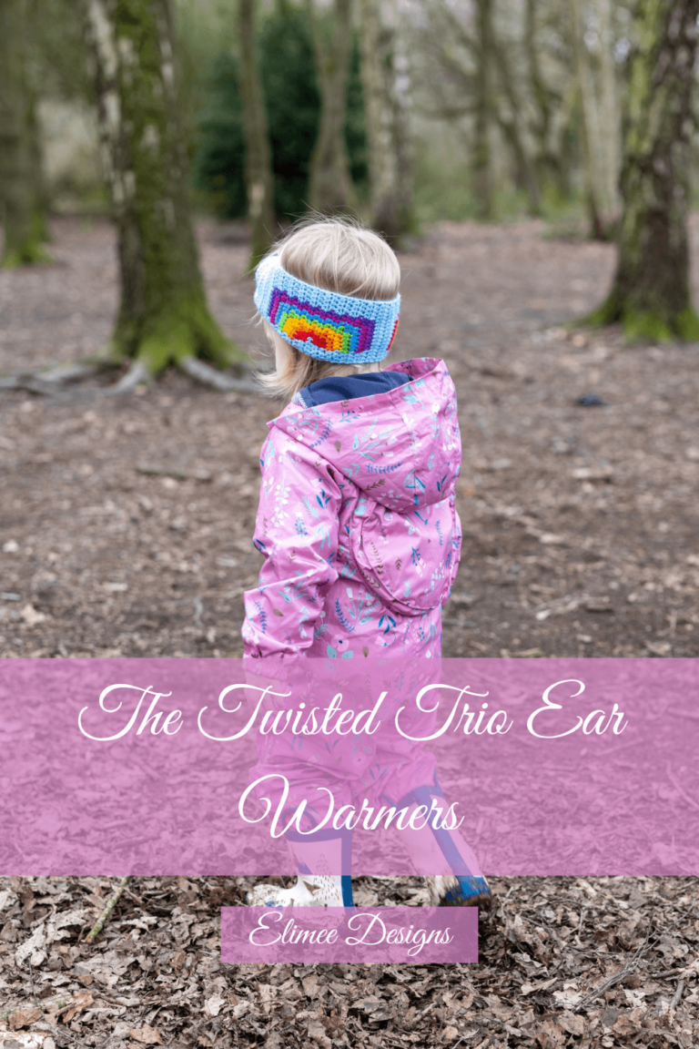 Child wearing rainbow ear warmer