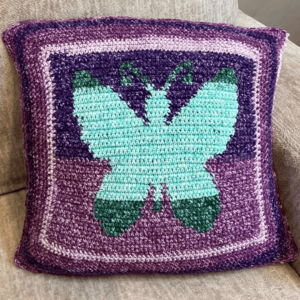 Crocheted butterfly pillow