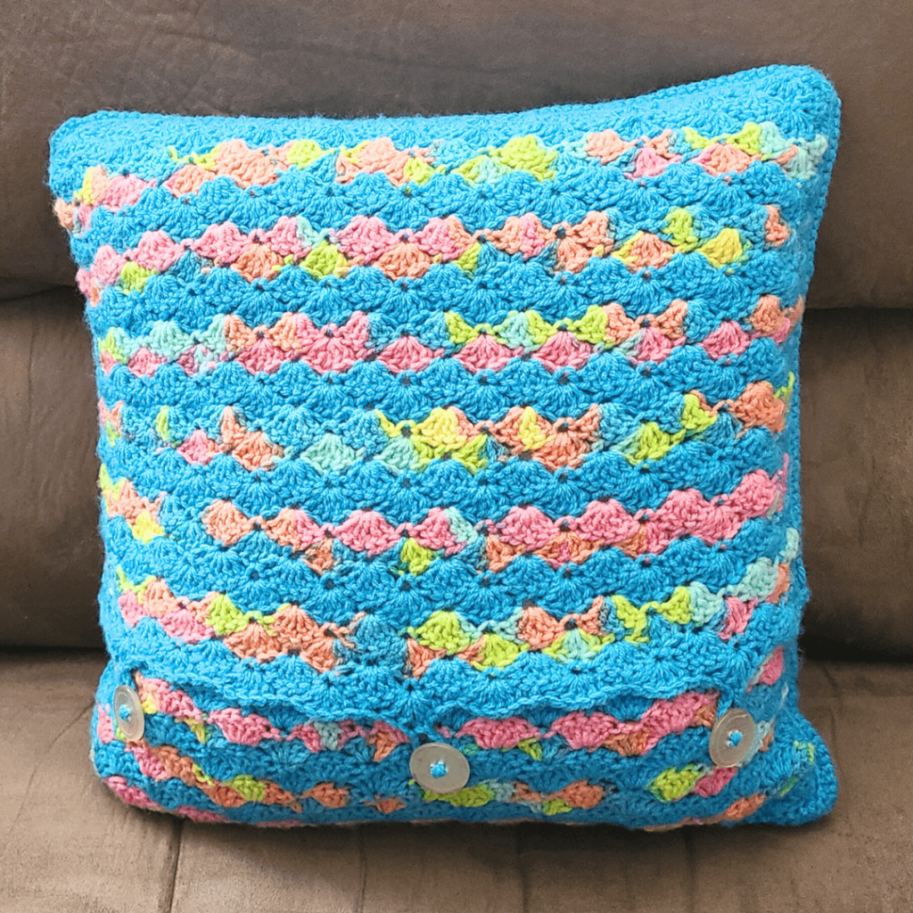 Colorful crochet shell stitch pillow