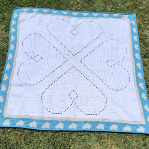 White crochet heart blanket