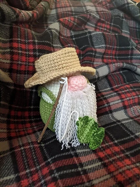 Crocheted farmer gnome plaid