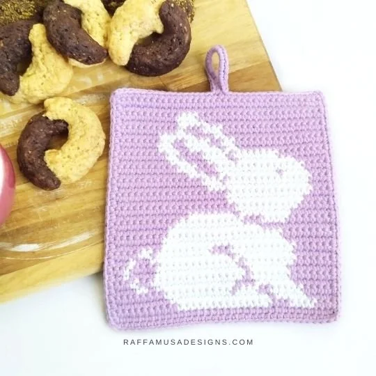 Purple crochet bunny pot holder