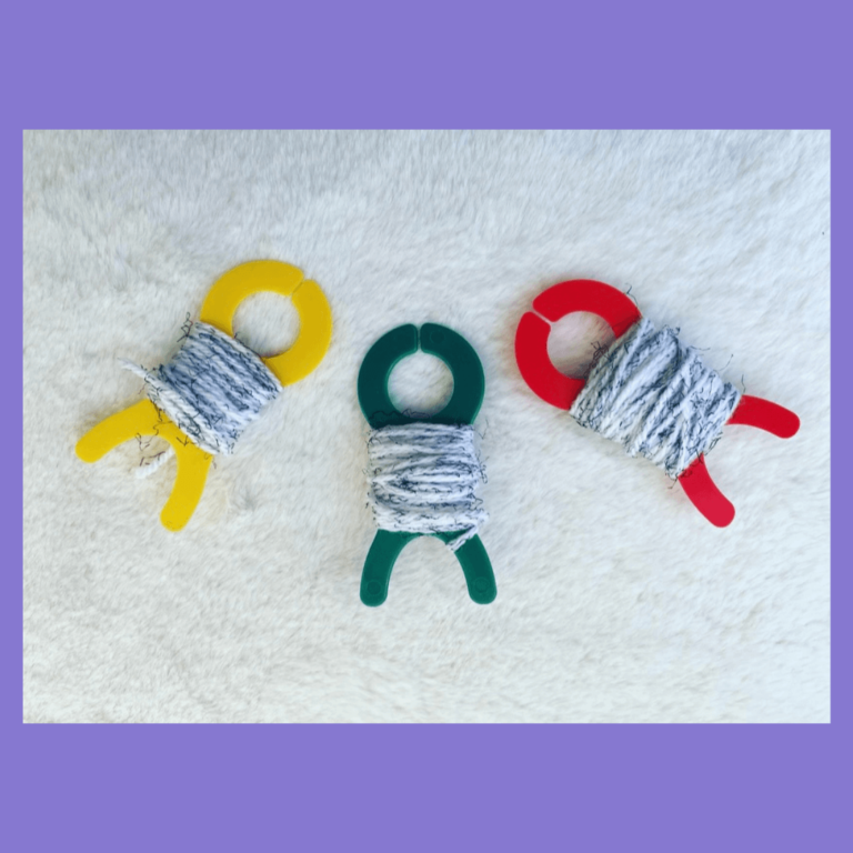 Colorful yarn winders with yarn