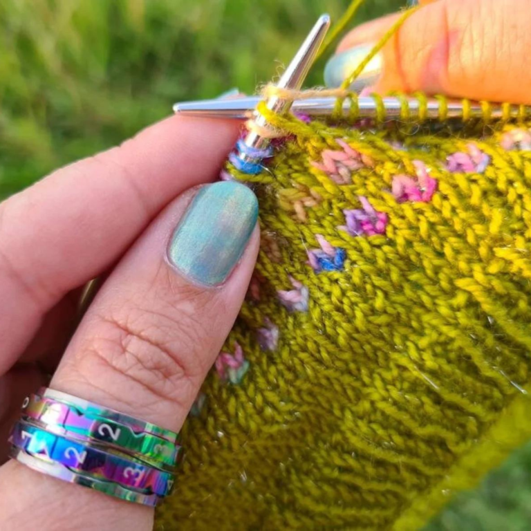 Knitting colorful yarn outdoors