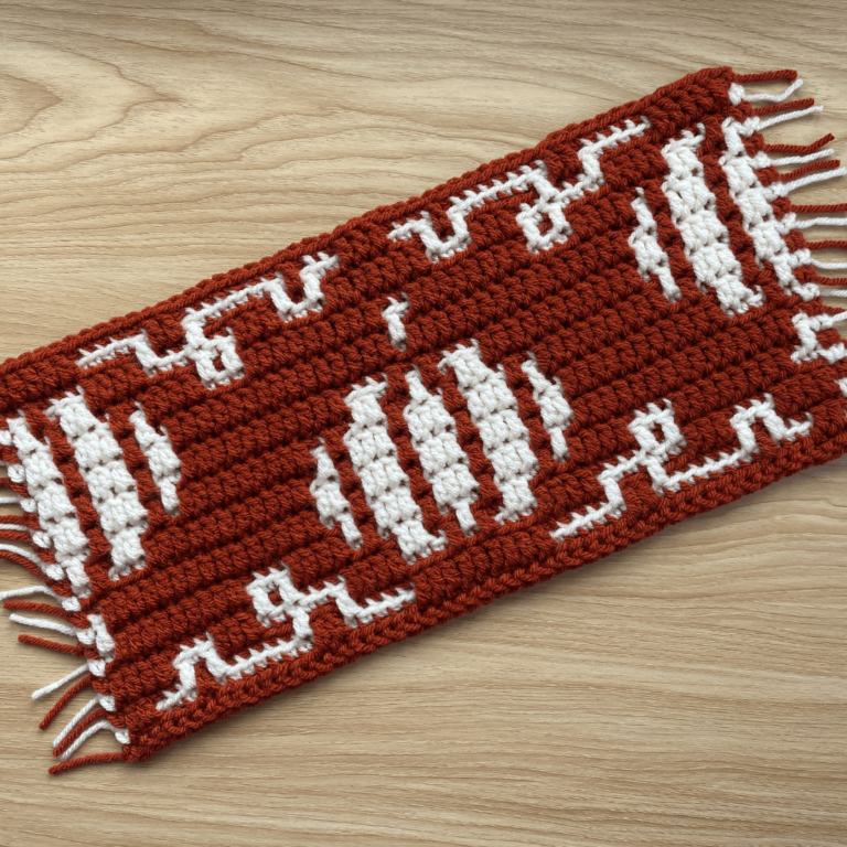 Crocheted football pattern item