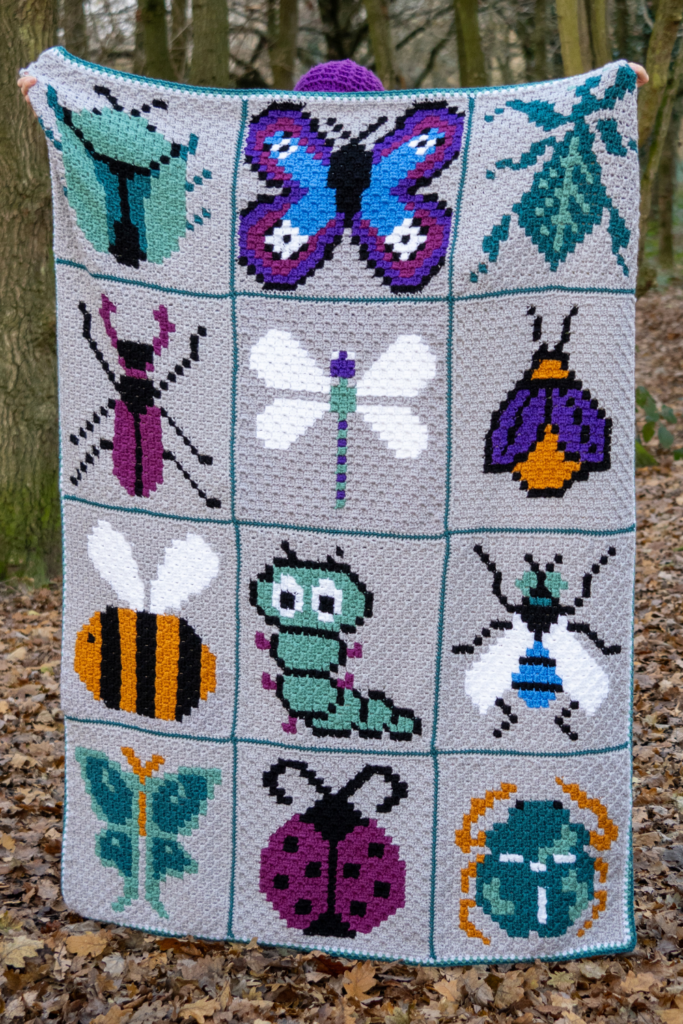Colorful crocheted insect blanket