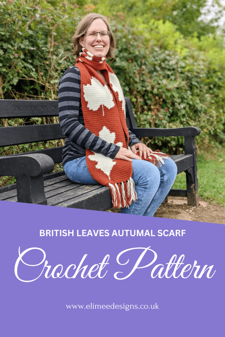 Woman wearing autumn leaf scarf