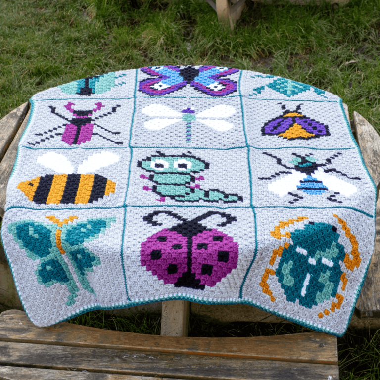 Colorful pixel bug crochet blanket