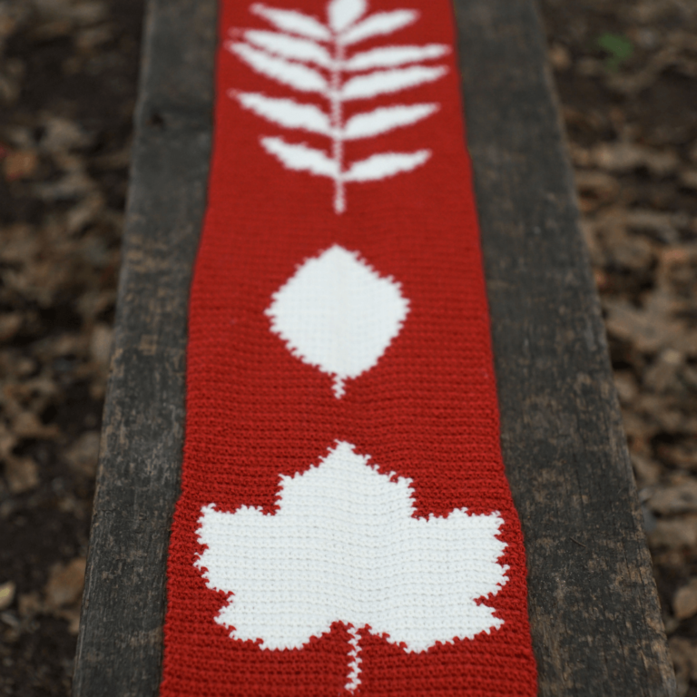 Red knitted leaf patterns