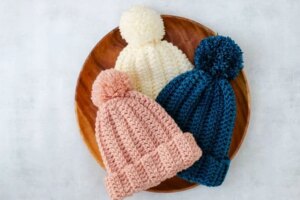 Cozy knitted pom-pom beanies