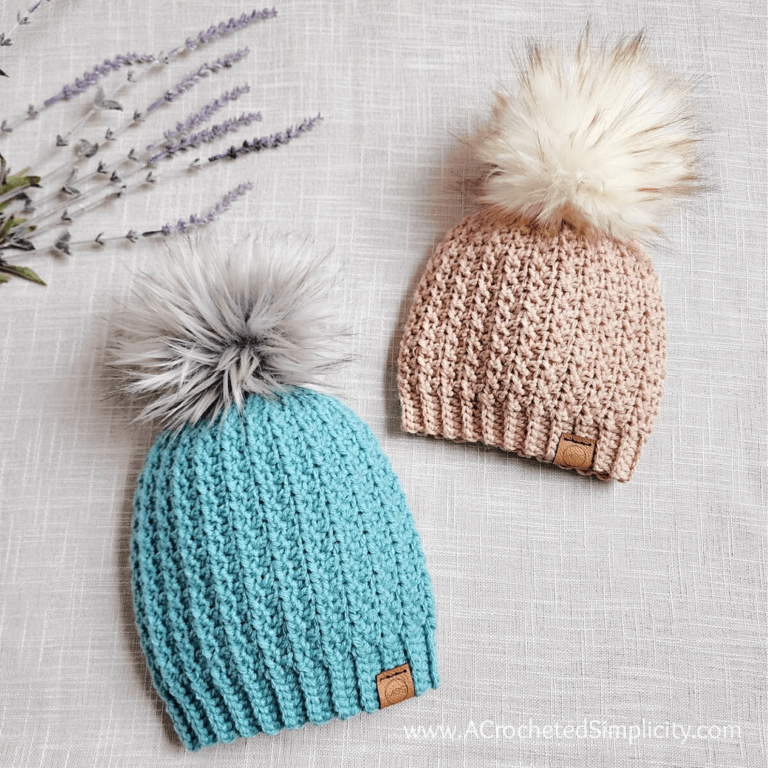 Teal pink crocheted pom-pom hats