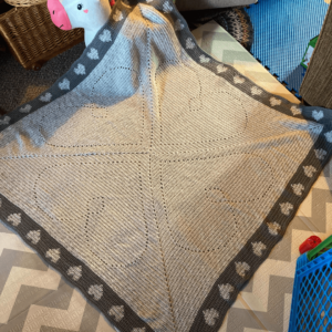 Handmade grey heart blanket