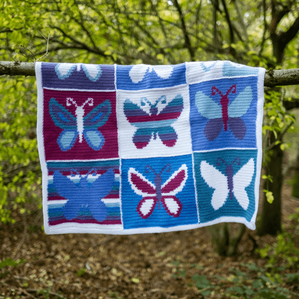 Crochet butterfly blanket outdoors