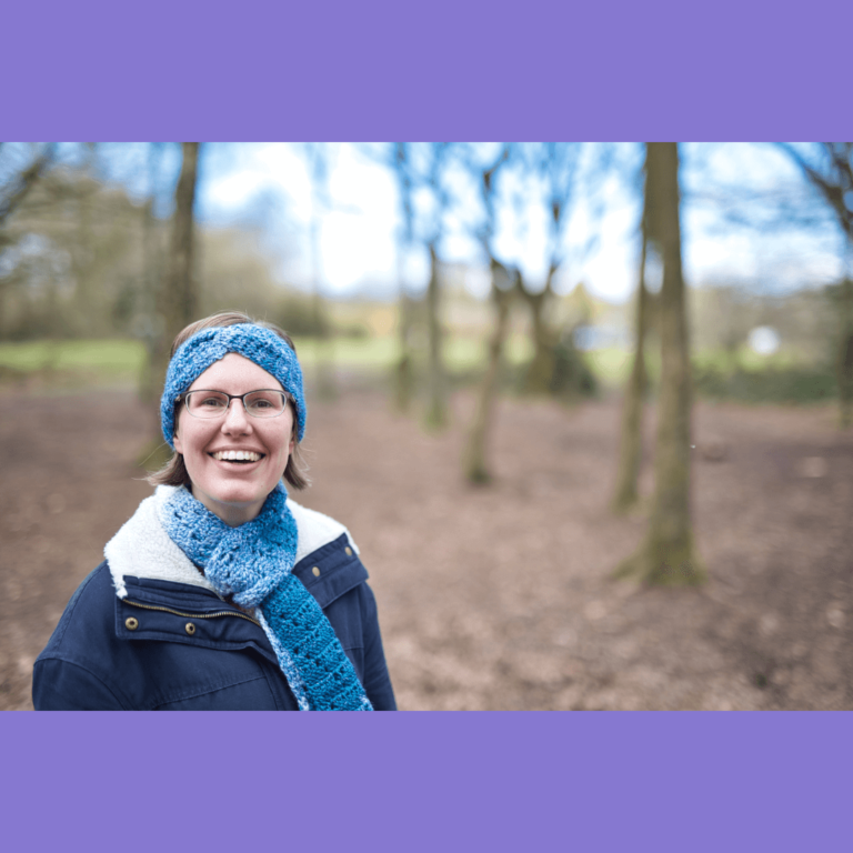 Smiling woman blue crochet
