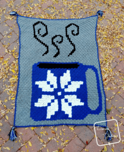 Crocheted snowflake mug blanket