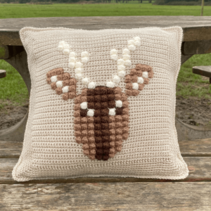 Bobble stitch deer pillow