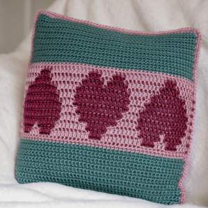 Teal pink crocheted tree pillow