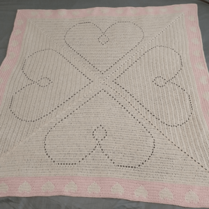 Cream crochet heart baby blanket