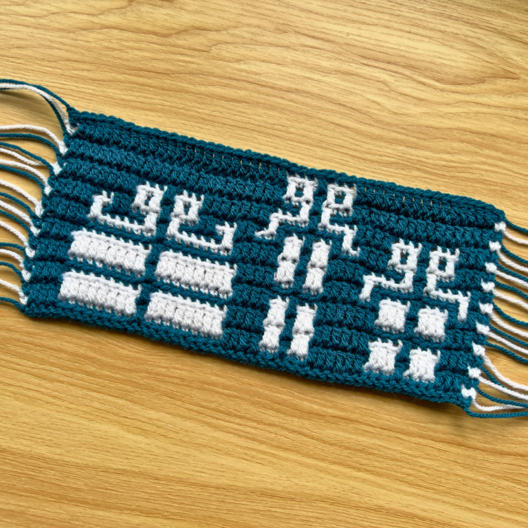 Teal white pixelated crochet