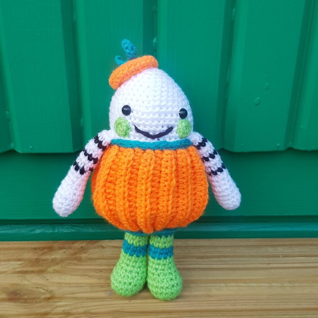 Crochet toy green background