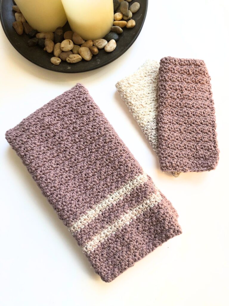 Crocheted cloths, candles, stones