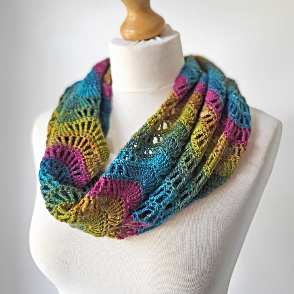Colorful crocheted cowl on mannequin