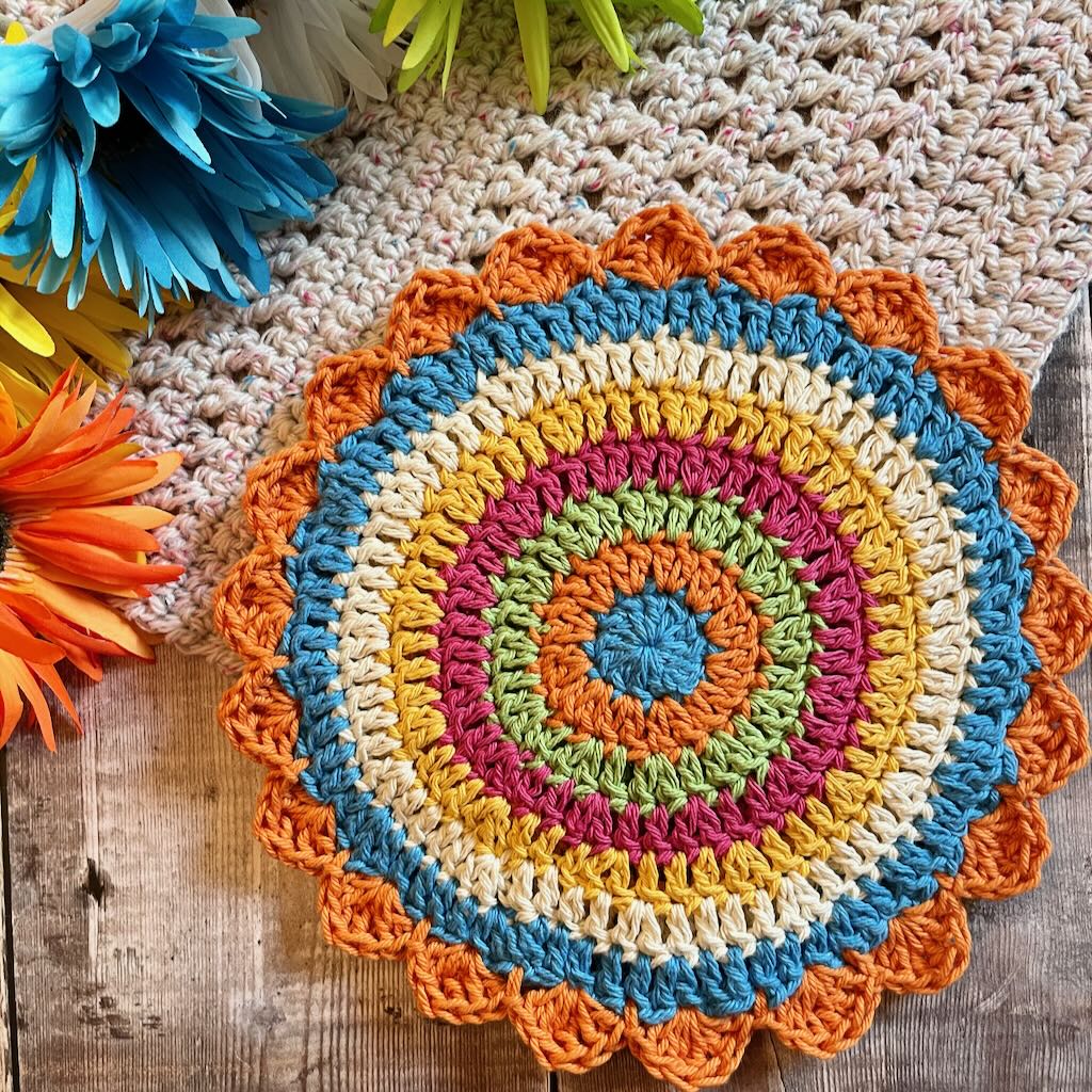 Colorful crochet doily on wood