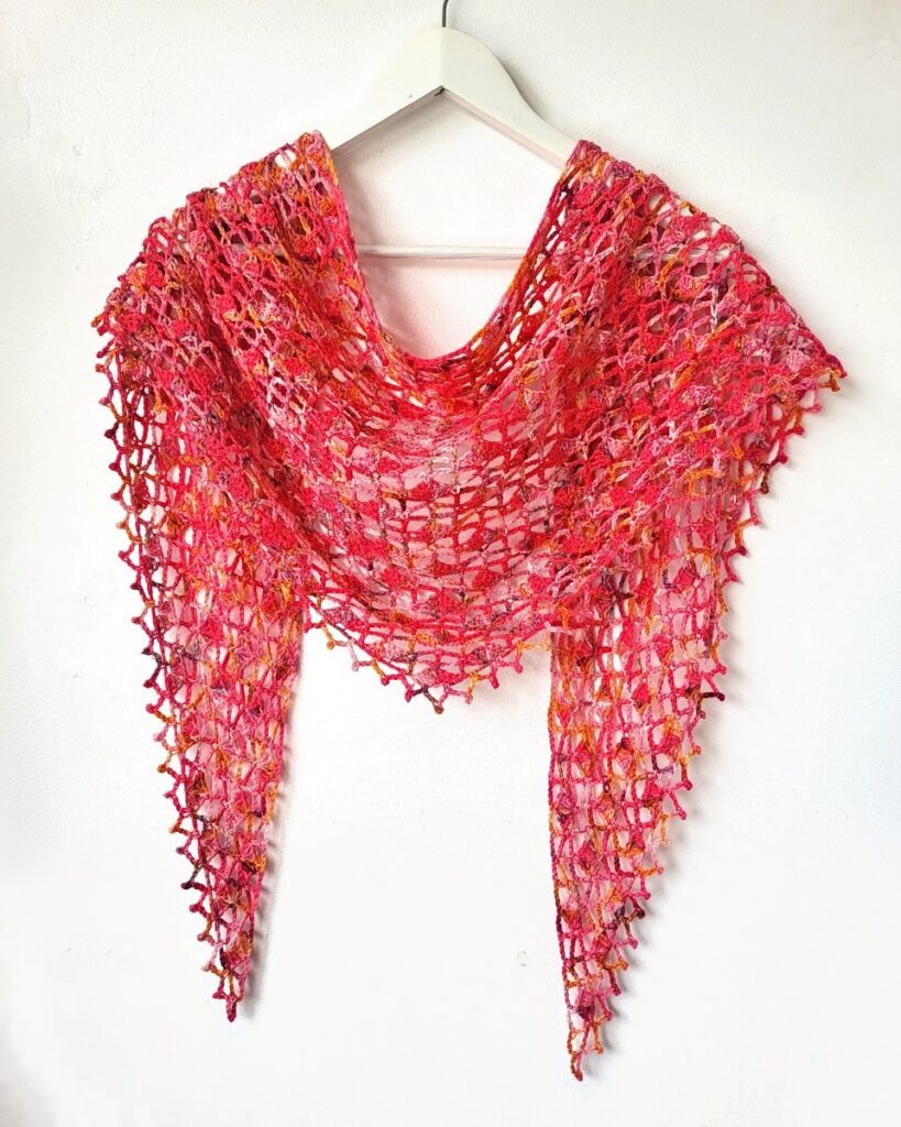Crocheted pink and red shawl