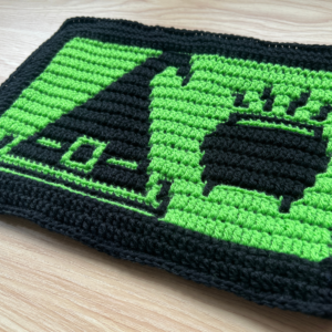 Crochet witch hat and cauldron