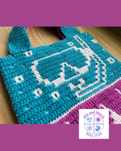 Crocheted bag with pixel art