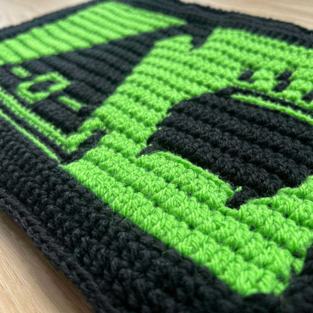 Black and green crocheted pattern